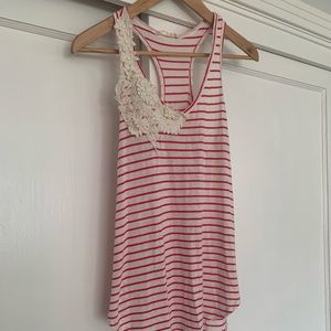 Super cute striped racer back tank. Boutique